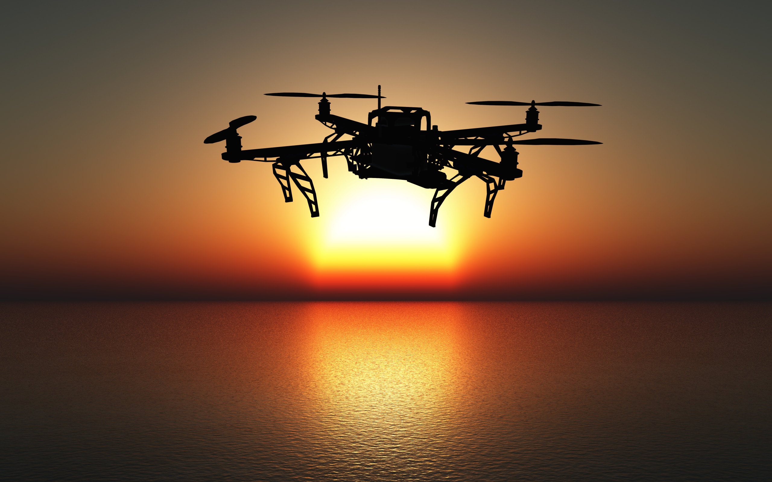 drone vole face au couché de soleil